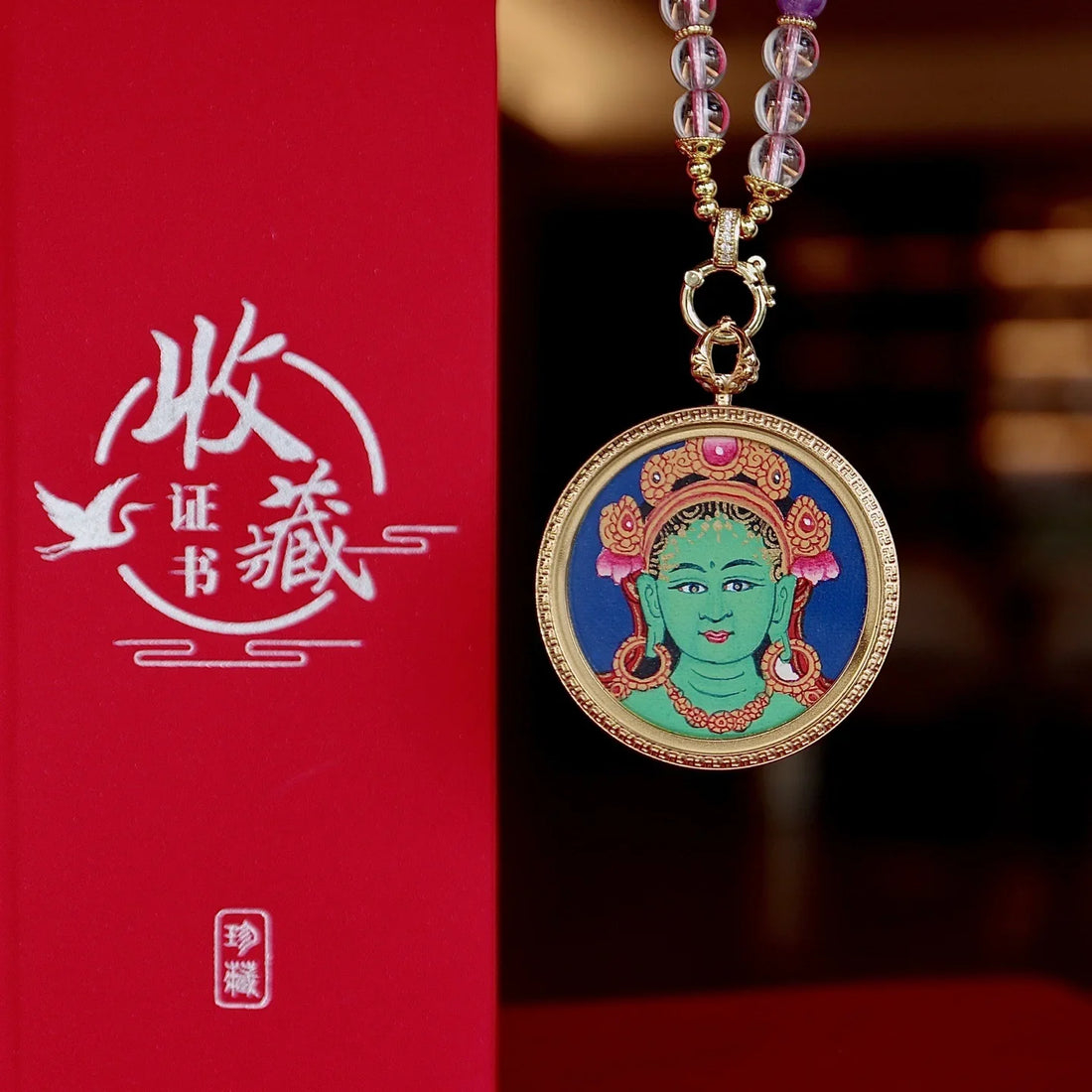 Hand-painted Green Tara pendant inspired by traditional Tibetan thangka art