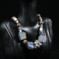 Minimalist lapis lazuli choker necklace worn by model, vintage boho jewelry style