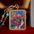 Green Tara pendant worn as Buddhist spiritual amulet