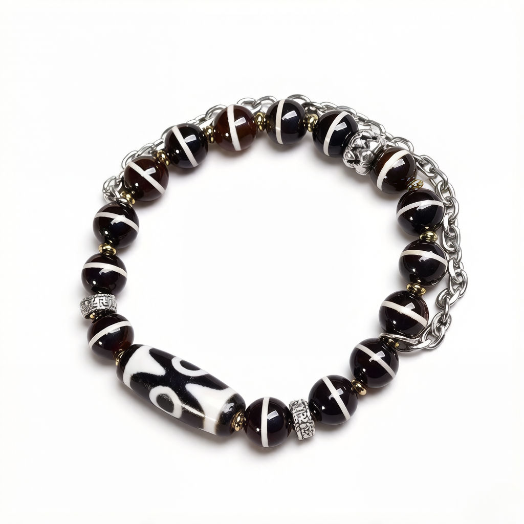 Aurafeng Tibetan bracelet with three-eye dzi bead and old West Asian inlaid details