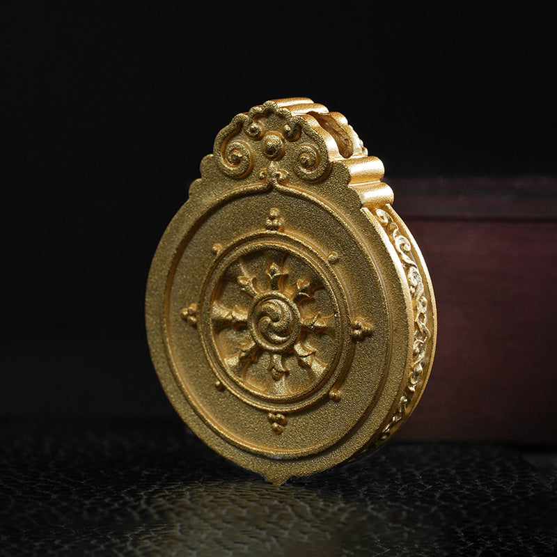Sacred gau box pendant back view with traditional Tibetan symbols