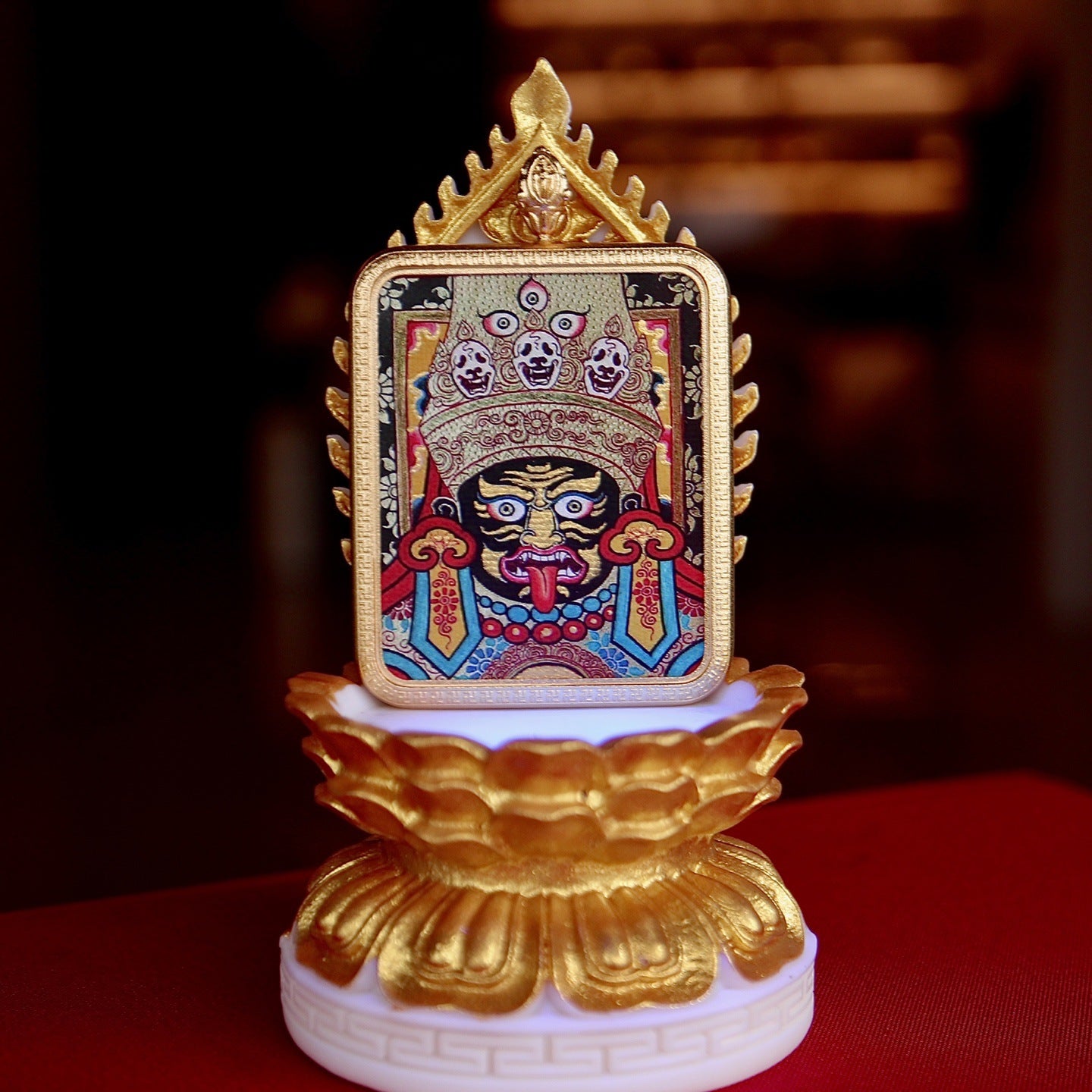 Green Tara pendant worn as Buddhist spiritual amulet