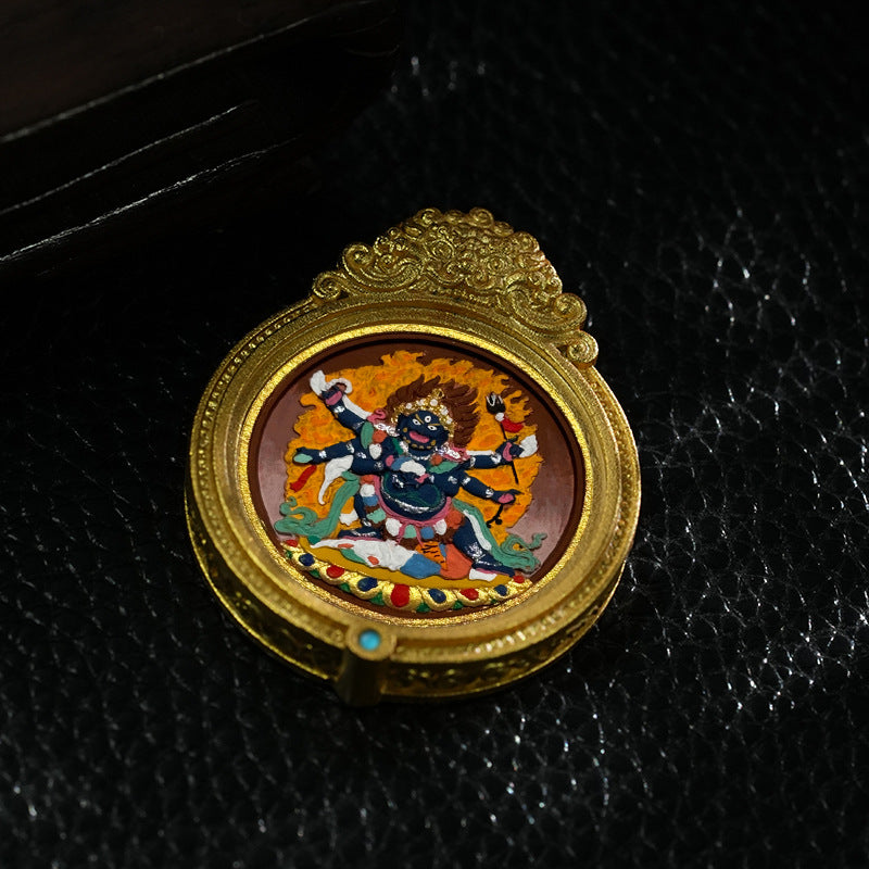 Close-up of hand-painted Thangka detail of Jambhala & Green Tara