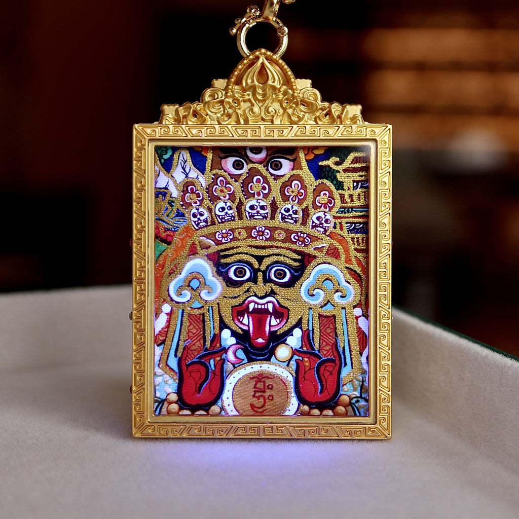 Close-up of hand-painted Yellow Jambhala thangka with intricate mineral pigment details