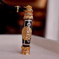 Hand wearing Aurafeng dzi bead necklace, casual daily style for men and women