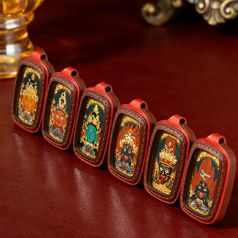 Collection of Tibetan gau box necklaces with different deity thangka designs