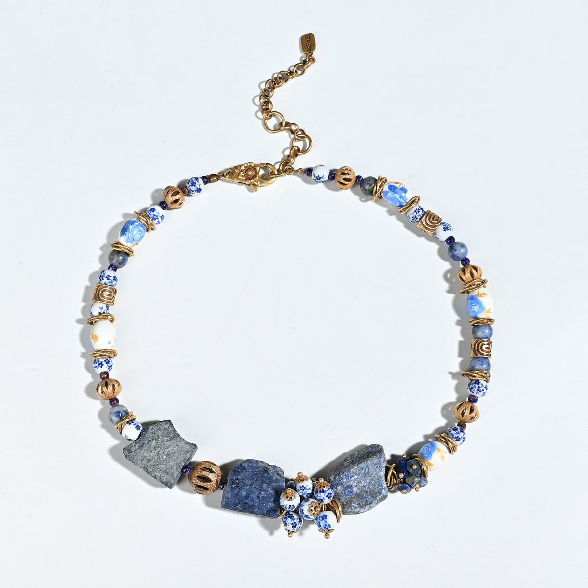 Handmade vintage lapis lazuli and blue porcelain necklace with raw stone accents, minimalist choker jewelry