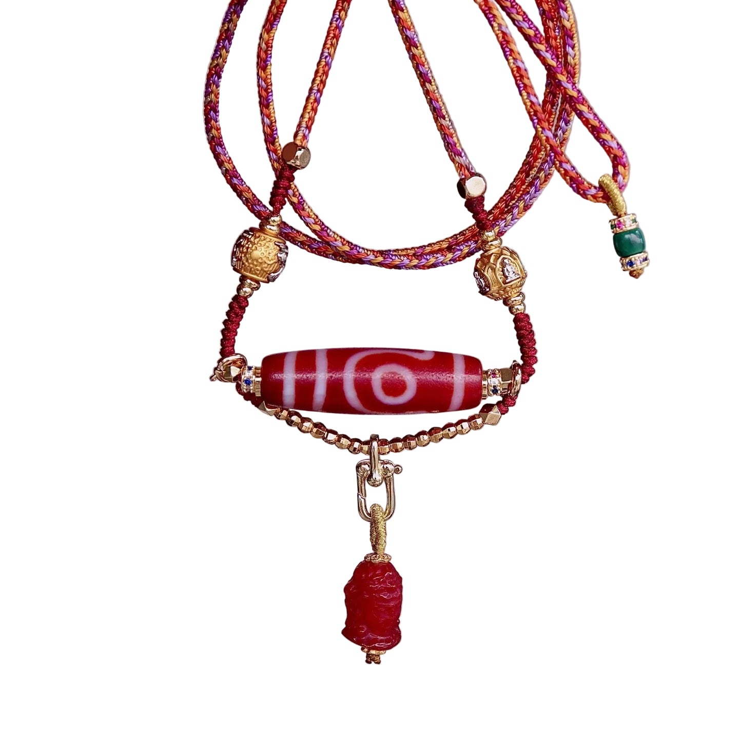 Two eyed Tibetan dzi bead pendant symbolizing wealth and protection